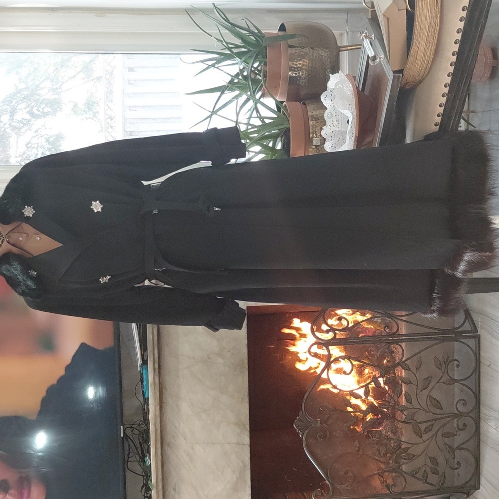 Elegant Black Coat with Goat Fur and Star Accents